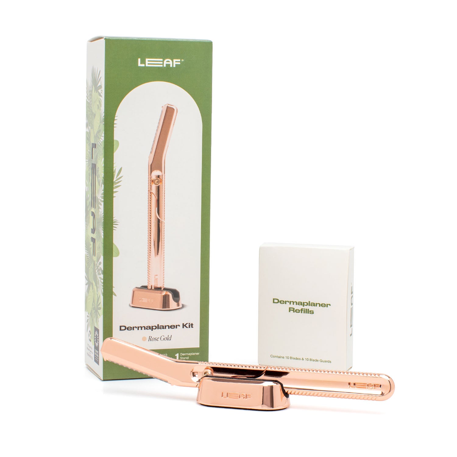 Leaf Dermaplaner Kit, with box, tool, stand and refill pack in rose gold.