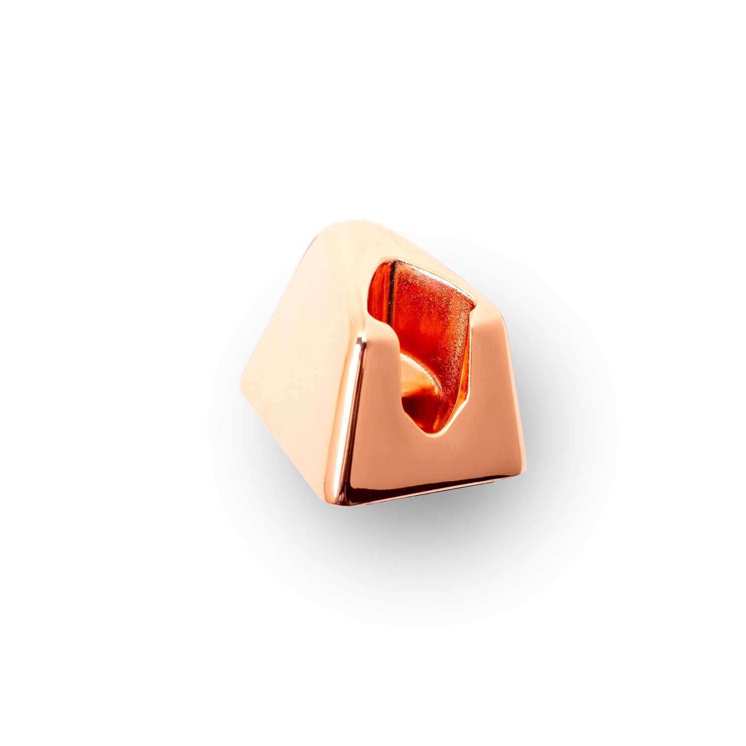 A Leaf Shave brand Leaf razor stand in the finish called Rose Gold