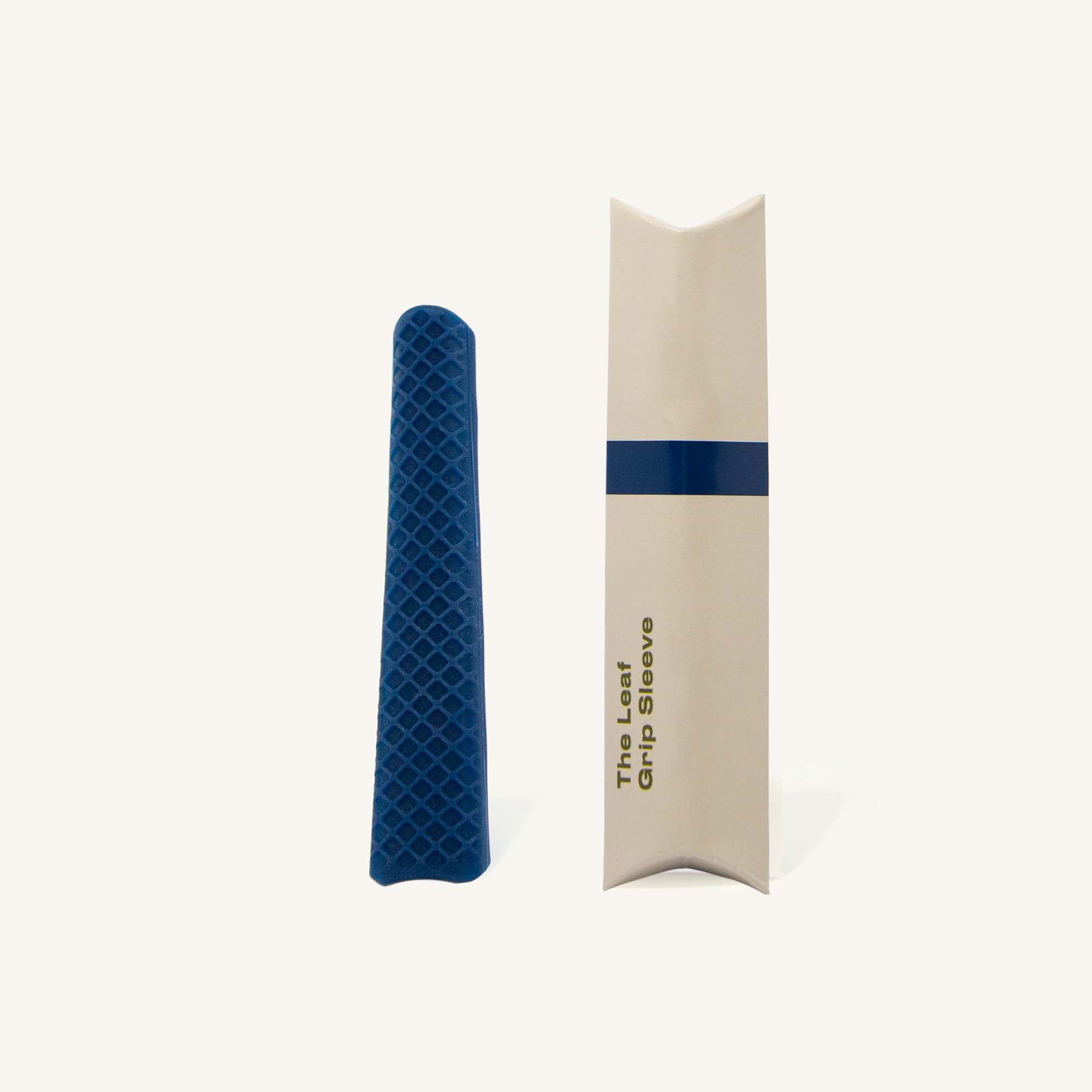 Dark blue grip next to packaging.