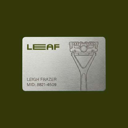 Metal business card with 'LEAF' branding on a green background
