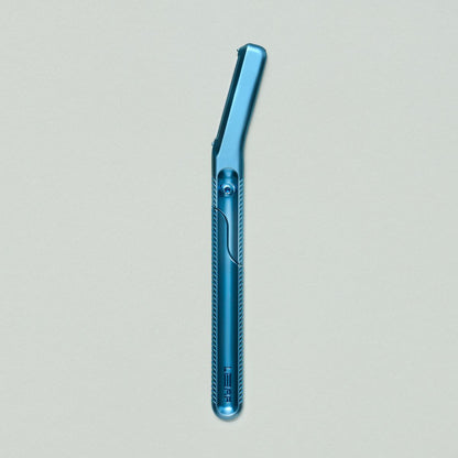 Glacier, light blue dermaplaner on grey background