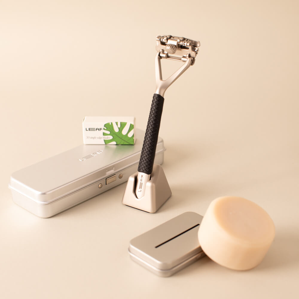 The silver leaf super bundle with a Leaf razor, blades, case, recycling tin, and shave soap bar