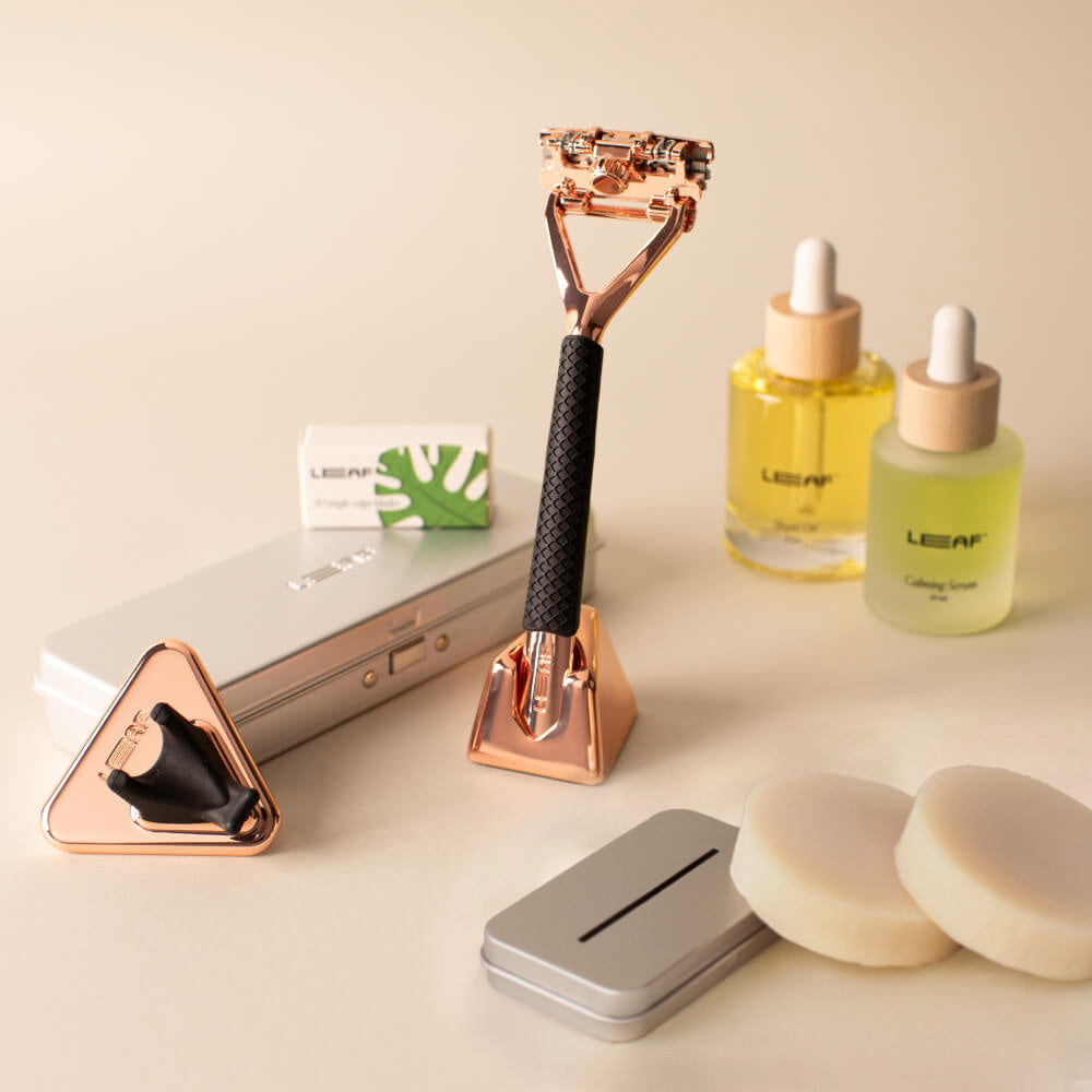 Rose Gold leaf everything bundle with Leaf razor, stand, blades, case, recycling tin, calming serum, shave oil, shower holder, grip, and shave soap bar