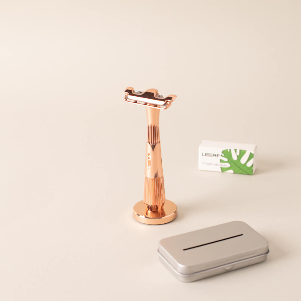 Rose gold single edge kit with single edge razor, blades, and recycling tin