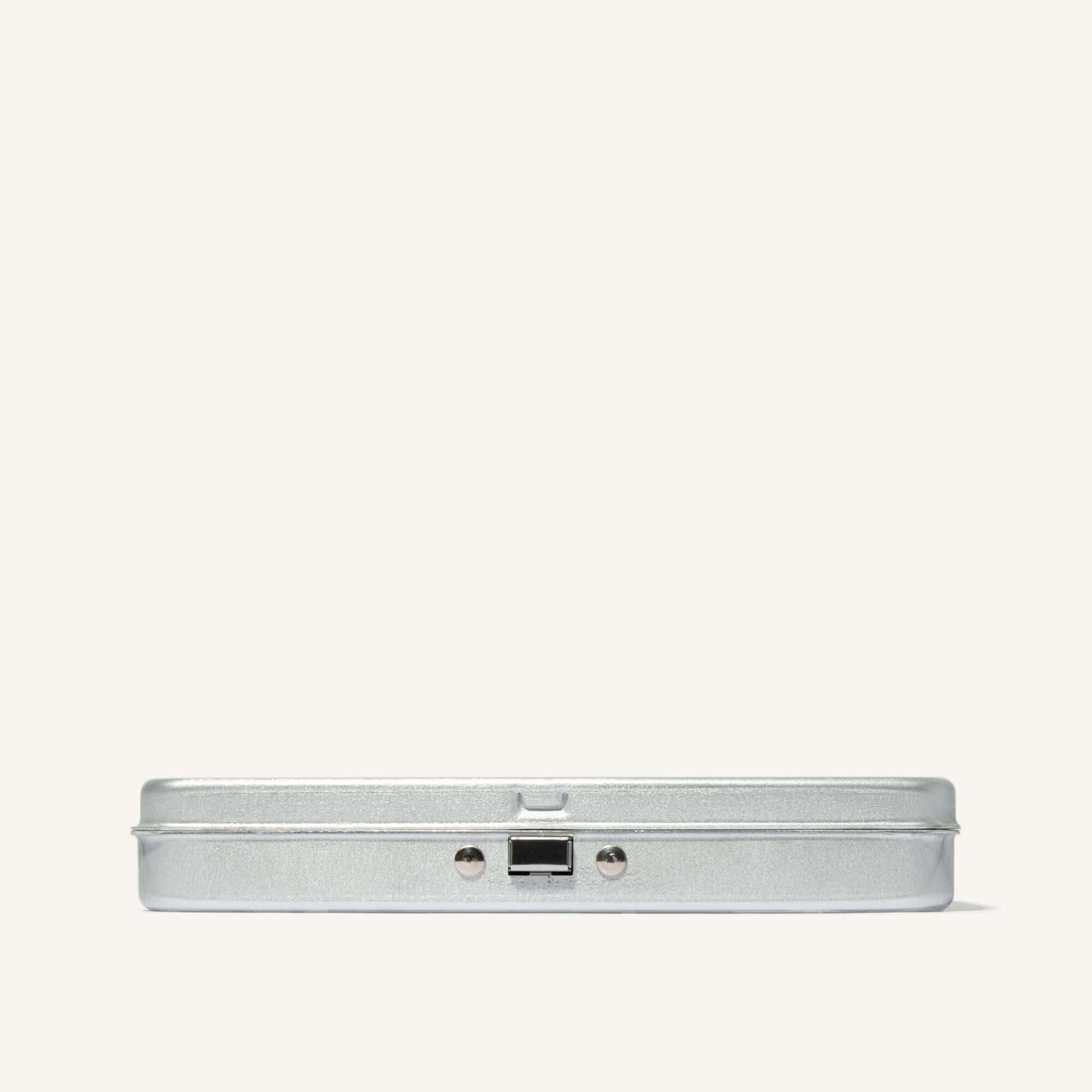 Silver case on white background, front face.